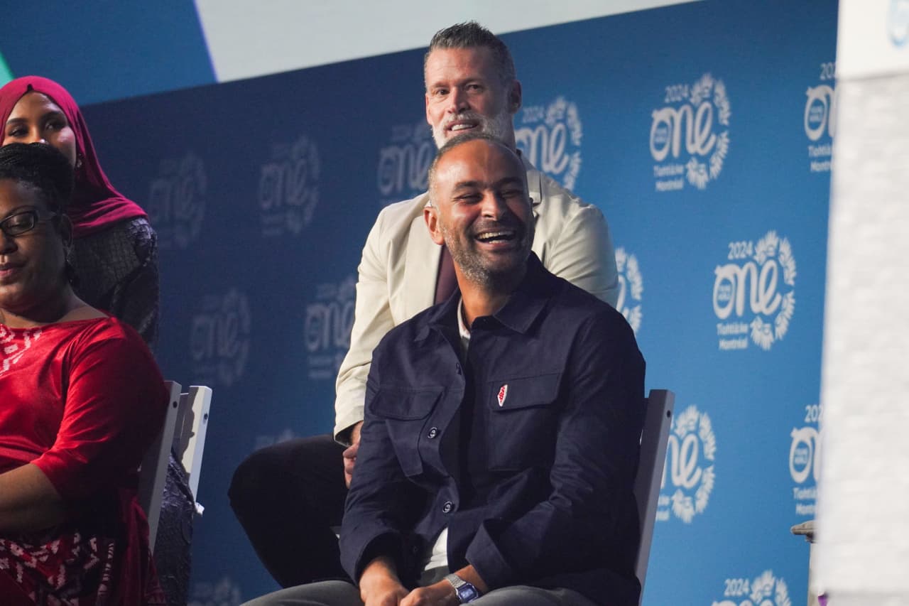 Seif Taher, founder of the SeifSpace Collective, on stage at One Young World